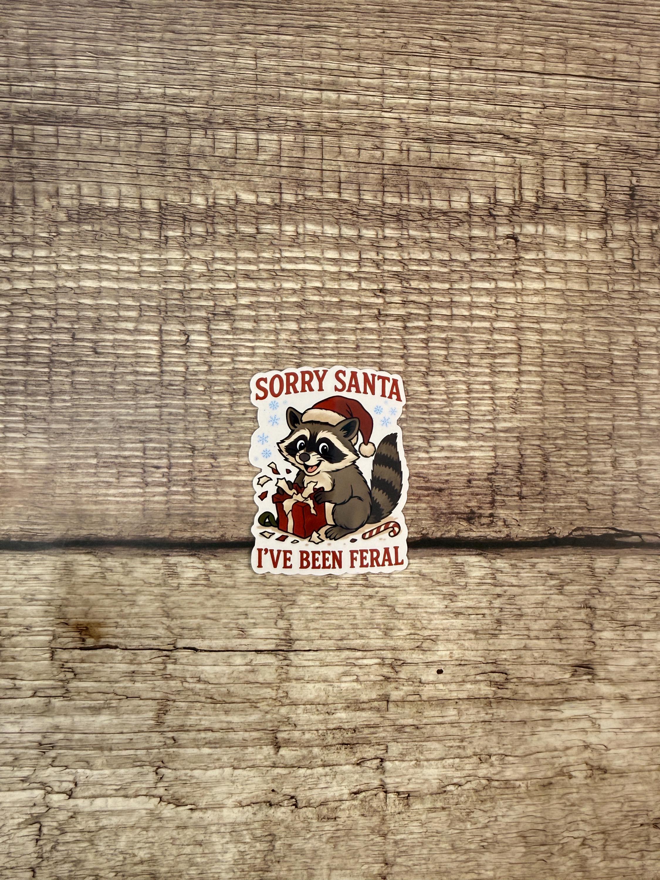 Funny Christmas Waterproof Sticker "Sorry Santa I’ve Been Feral" Cute Raccoon Holiday Humor Vinyl Decal Gift