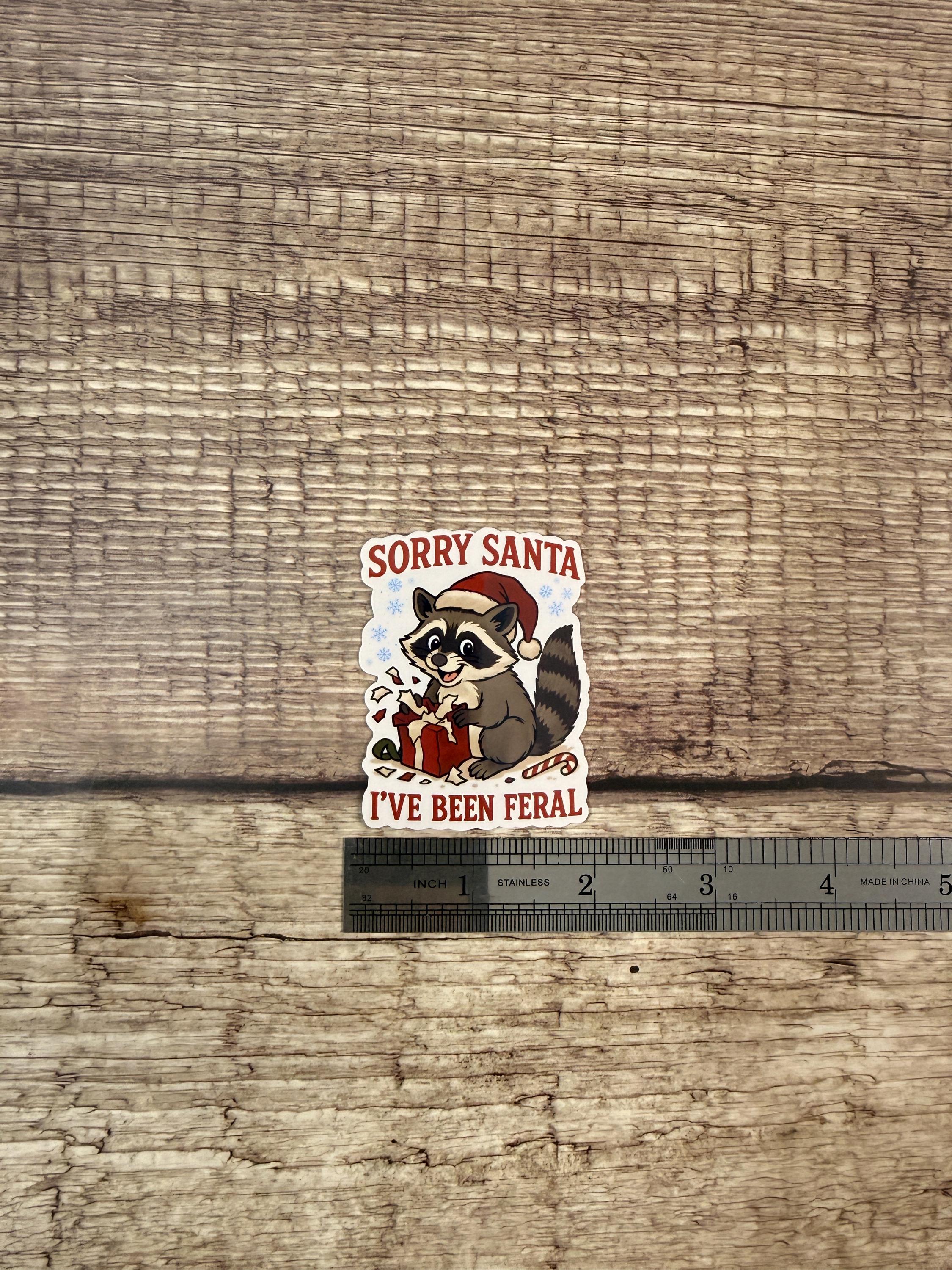 Funny Christmas Waterproof Sticker "Sorry Santa I’ve Been Feral" Cute Raccoon Holiday Humor Vinyl Decal Gift