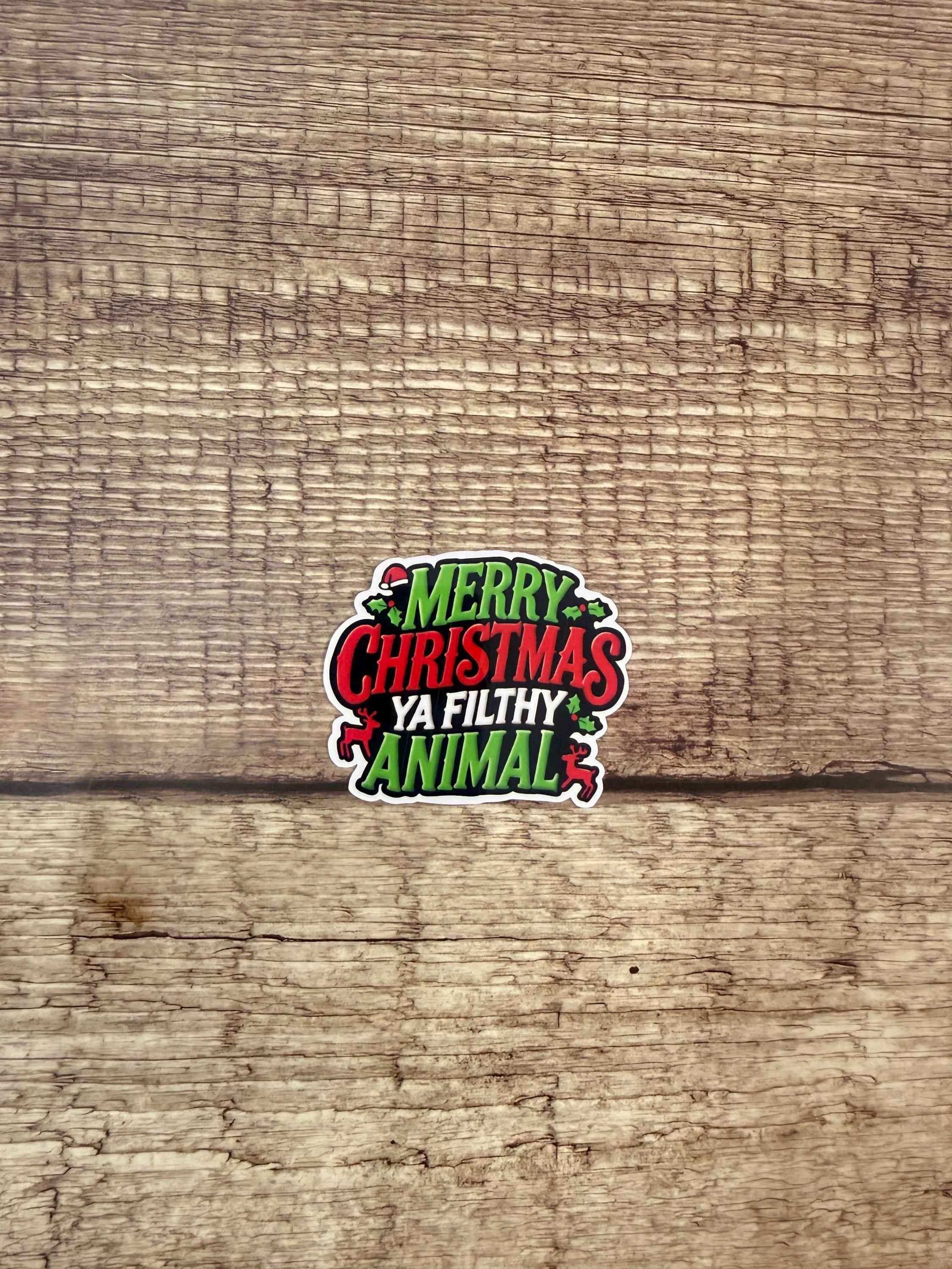 Funny Home Alone Movie Quote: Merry Christmas Ya Filthy Animal Waterproof Sticker