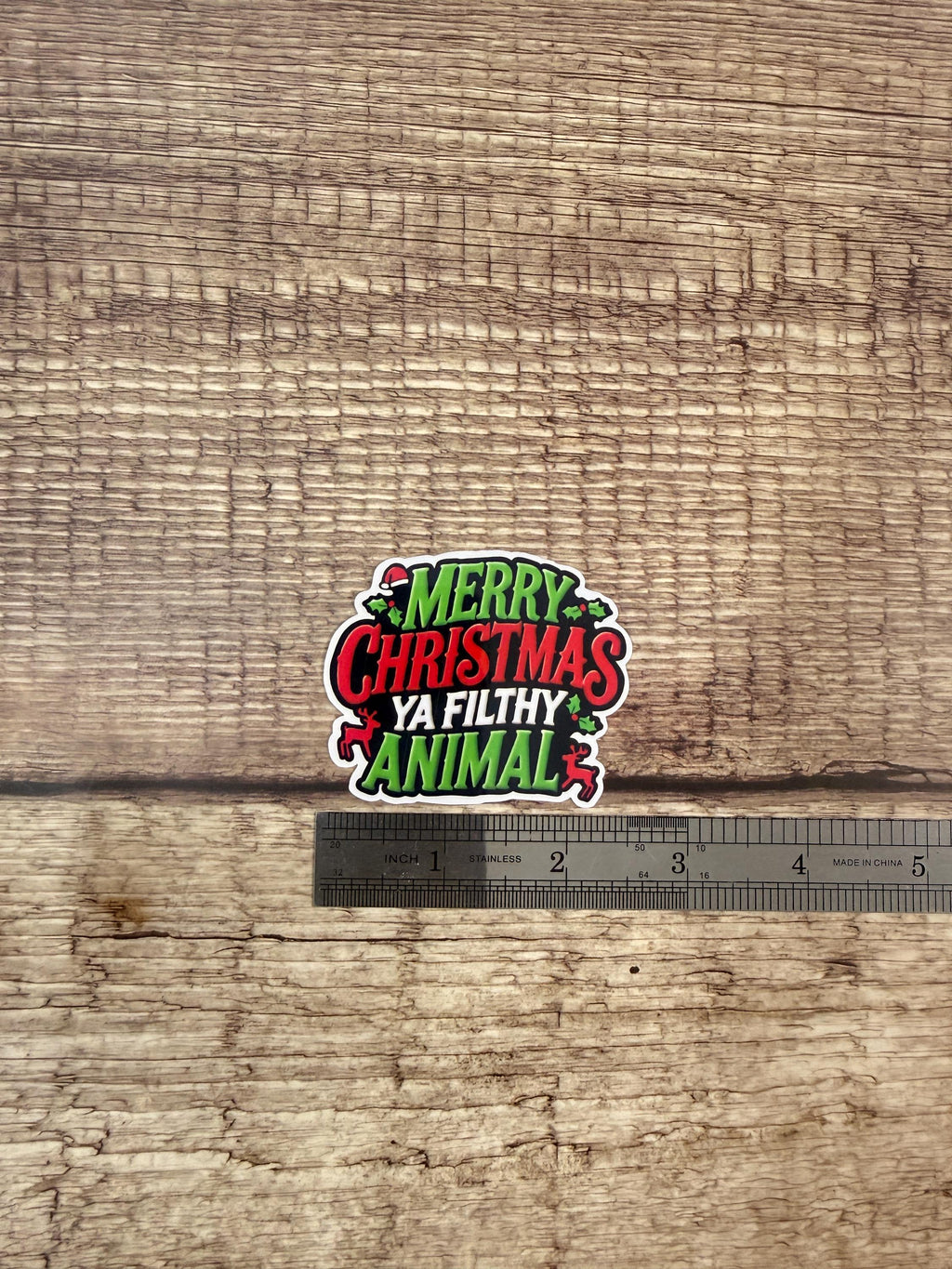 Funny Home Alone Movie Quote: Merry Christmas Ya Filthy Animal Waterproof Sticker