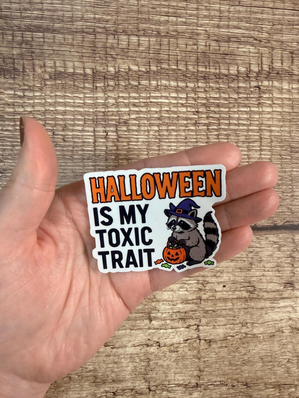 Funny Halloween Waterproof Sticker – "Halloween Is My Toxic Trait" Raccoon Vinyl Decal Gift